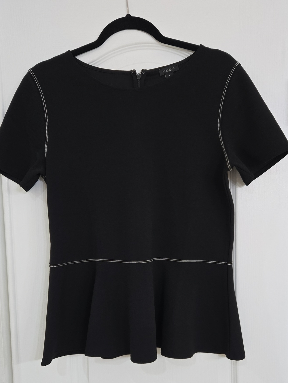 Black Short-Sleeve Peplum Top with Contrast Stitching